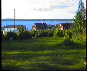 Landschaft und Häuser bei Posio